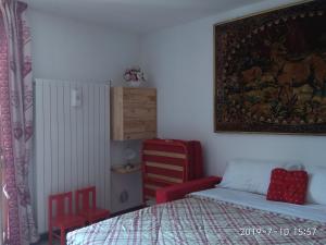 En eller flere senge i et værelse på Monoloc. Bosco delle Fate