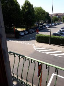 a view of a parking lot from a balcony at Guesthouse Dusart in Hasselt