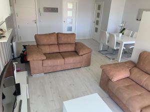 Część wypoczynkowa w obiekcie Apartamento de lujo en La Toja