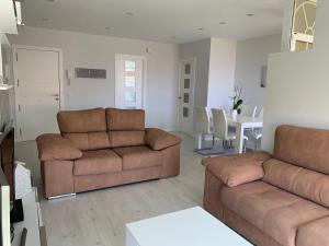 Część wypoczynkowa w obiekcie Apartamento de lujo en La Toja