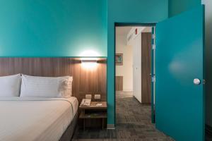 Postel nebo postele na pokoji v ubytování Holiday Inn - Lima Airport by IHG