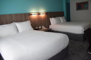 Postel nebo postele na pokoji v ubytování Holiday Inn - Lima Airport by IHG