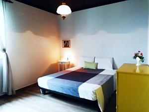 Ένα ή περισσότερα κρεβάτια σε δωμάτιο στο Santa Barbara Holiday Rentals