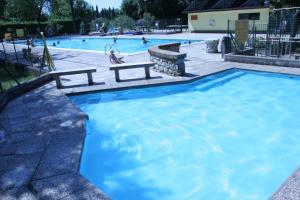 The swimming pool at or near Camping Aquileia