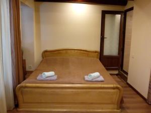 Ένα ή περισσότερα κρεβάτια σε δωμάτιο στο Low budget room with King Size bed