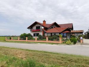 a house on the side of a road at T.S.G. Šimanović in Klinča Sela