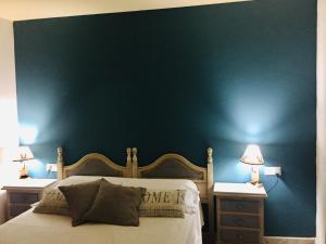 Cama o camas de una habitación en La Fusteria del Casat
