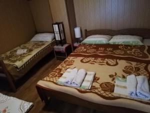 Ένα ή περισσότερα κρεβάτια σε δωμάτιο στο T.S.G. Šimanović