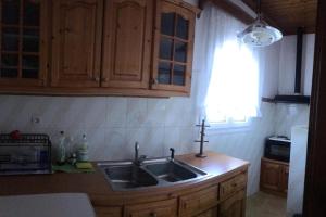 Kuchyň nebo kuchyňský kout v ubytování Dimitris House