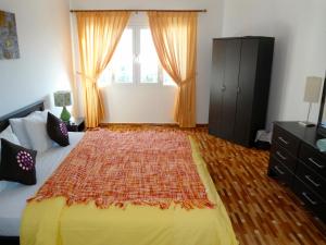 A bed or beds in a room at Lana Villa