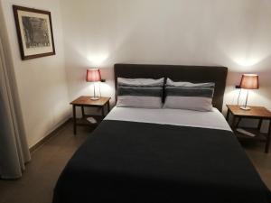 Postel nebo postele na pokoji v ubytování DreaMilan B&B