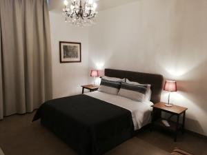 Postel nebo postele na pokoji v ubytování DreaMilan B&B