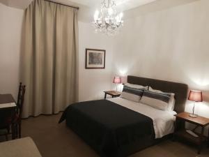 Postel nebo postele na pokoji v ubytování DreaMilan B&B