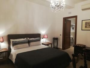 Postel nebo postele na pokoji v ubytování DreaMilan B&B