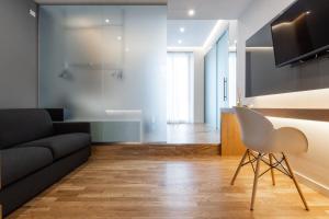 TV a/nebo společenská místnost v ubytování Concept Terrace Hotel
