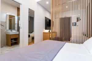 Postel nebo postele na pokoji v ubytování Concept Terrace Hotel