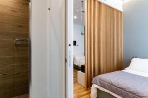 Postel nebo postele na pokoji v ubytování Concept Terrace Hotel