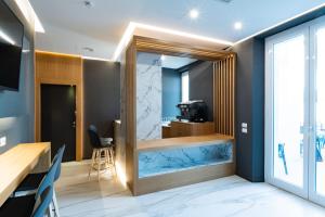 Postel nebo postele na pokoji v ubytování Concept Terrace Hotel