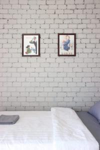 Sorya Guesthouse & Dolphin Tours客房内的一张或多张床位