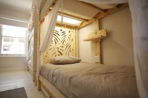 Postel nebo postele na pokoji v ubytování MOY Guesthouse & Backpackers