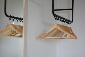 a mirror hanging on a wall next to a door at YOU & CO. Saler Beach Boutique in Valencia