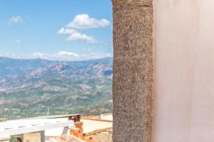a pillar of a building with a view of mountains at Villa Maddalena in Baunei