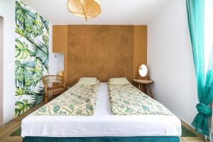 Postel nebo postele na pokoji v ubytování Willa Onyks Apartamenty