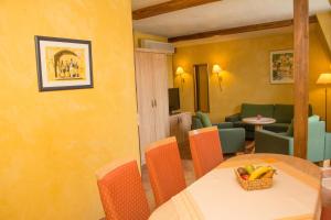Istumisnurk majutusasutuses Hotel Casa Rustica - Eintrittskarten für den Europapark erhalten Sie garantiert über uns!