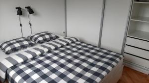 Postel nebo postele na pokoji v ubytování Apartment Exclusive