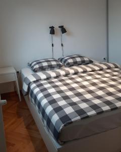 Postel nebo postele na pokoji v ubytování Apartment Exclusive