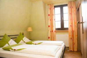 Voodi või voodid majutusasutuse Hotel Casa Rustica - Eintrittskarten für den Europapark erhalten Sie garantiert über uns! toas