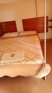 Säng eller sängar i ett rum på Kanberra Hotel