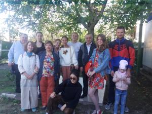 a group of people posing for a picture at Victoria in Bagdatʼi