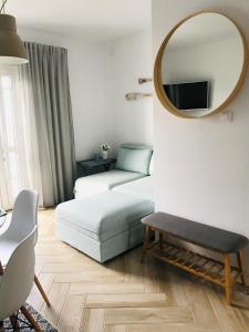 Postel nebo postele na pokoji v ubytování Apartamenty Piaskowe B21 z tarasem na dachu