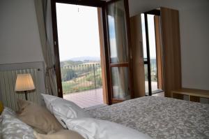 Katil atau katil-katil dalam bilik di Villa Patrizia