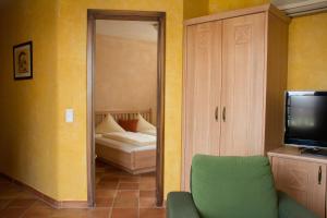 Voodi või voodid majutusasutuse Hotel Casa Rustica - Eintrittskarten für den Europapark erhalten Sie garantiert über uns! toas