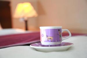 Postel nebo postele na pokoji v ubytování King Town Hotel