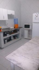 A cozinha ou cozinha compacta de Casa espaçosa- Camboinha