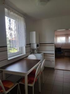 Postel nebo postele na pokoji v ubytování Penzion Pasohlávky