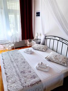Postel nebo postele na pokoji v ubytování Apartment Riva
