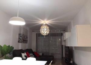 Część wypoczynkowa w obiekcie Apartamento Lujo, Primera linea playa, Garaje, Wifi, Piscina climatizada