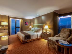 Postel nebo postele na pokoji v ubytování Similan Hotel Zhuhai-Gongbei Port