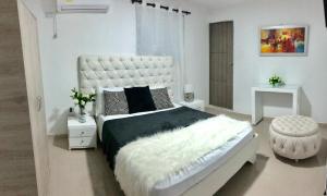 Ein Bett oder Betten in einem Zimmer der Unterkunft Hotel Platinum Barranquilla
