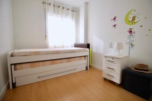 Posteľ alebo postele v izbe v ubytovaní La Rosaleda 71 by homeprive