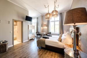 Postel nebo postele na pokoji v ubytování Das 53°Hotel