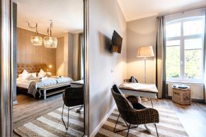 Postel nebo postele na pokoji v ubytování Das 53°Hotel
