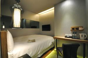 Posteľ alebo postele v izbe v ubytovaní Forward Suites II