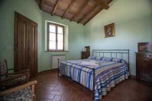 Giường trong phòng chung tại Agriturismo Belvedere Di Pierini E Brugi
