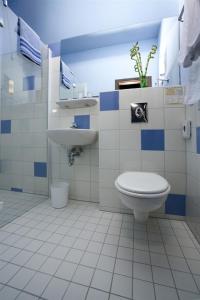 Koupelna v ubytování Melarose Feng Shui Hotel