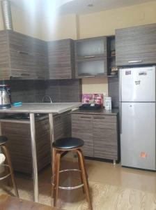 A cozinha ou cozinha compacta de Batumi Elite Apartment